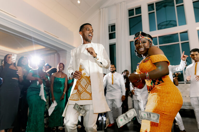 Couple celebrating on the dance floor during a lively wedding reception in the Lakeview Ballroom at Lakeview Pavilion in Foxborough, Massachusetts.
