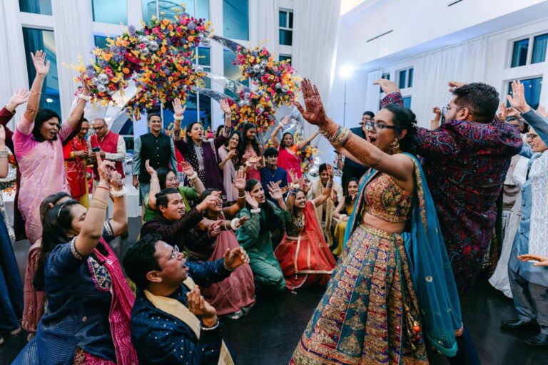 Guests dancing and celebrating during a lively wedding reception in the Lakeview Ballroom at Lakeview Pavilion in Foxborough, Massachusetts.