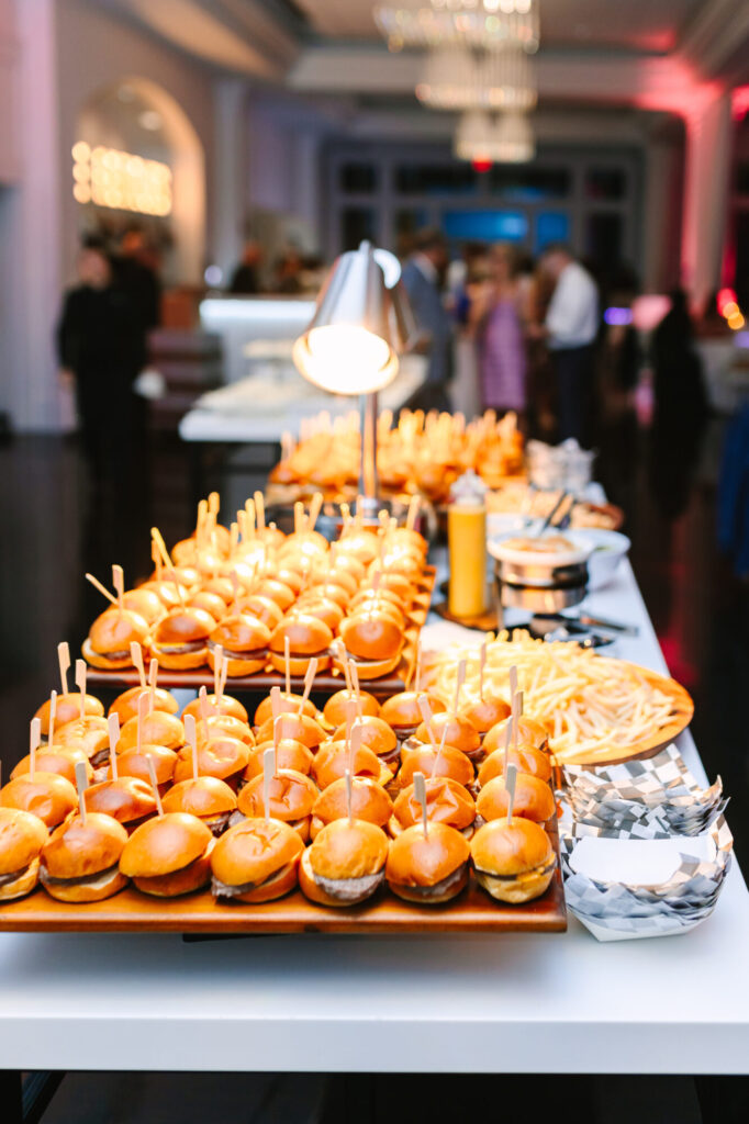 Gourmet cocktail hour slider station at Lakeview Pavilion featuring chef-prepared mini sandwiches and elegant food displays for weddings and private events in Foxborough, Massachusetts.