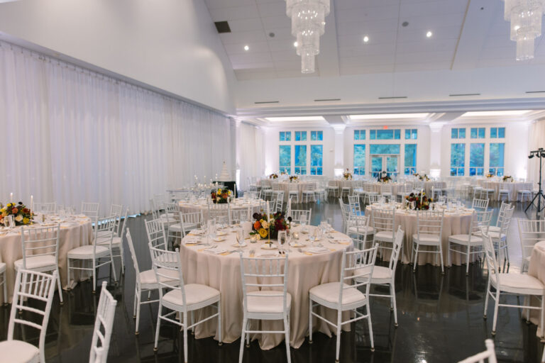 Elegant wedding reception setup in the Lakeview Ballroom at Lakeview Pavilion, a luxury waterfront wedding venue in Foxborough, Massachusetts.