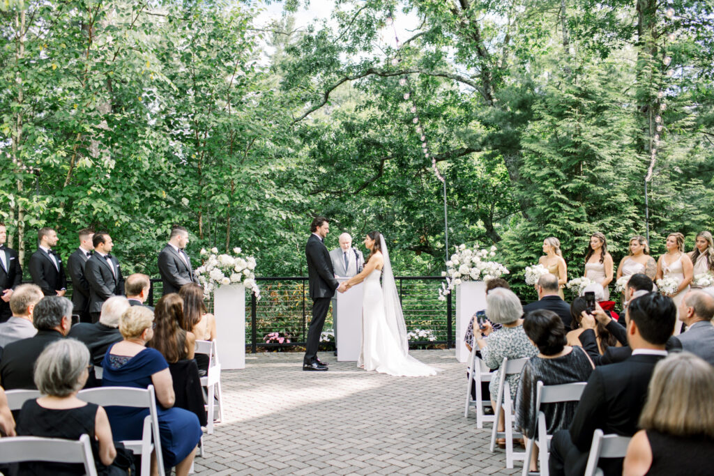Outdoor wedding ceremony on the private terrace outside the Lakeside Ballroom at Lakeview Pavilion in Foxborough, Massachusetts.